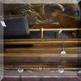 DF11. Brass fireplace fenders.
